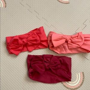 Three red/orange tone headbands